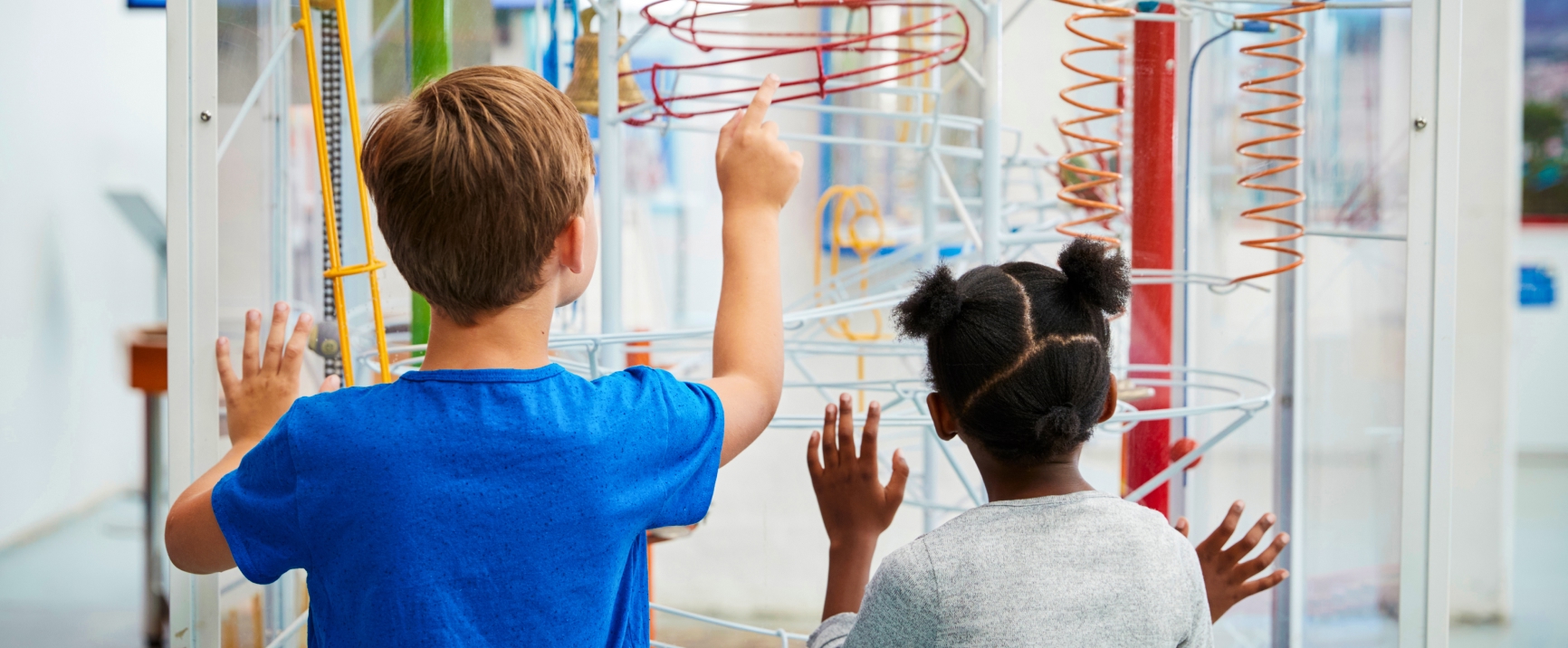 Children exploring an exhibit at Thinkery Del Valle children's museum